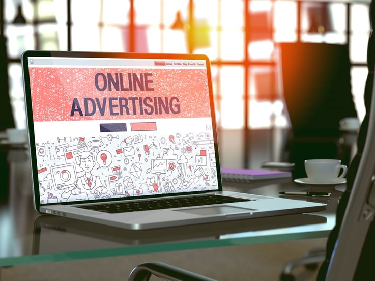 Online Advertising Concept. Closeup Landing Page on Laptop Screen in Doodle Design Style. On Background of Comfortable Working Place in Modern Office. Blurred, Toned Image. 3D Render..jpeg